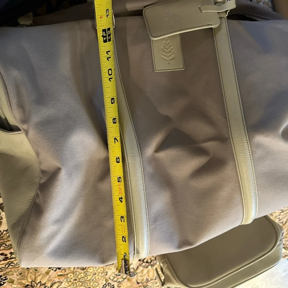 Exclusive Four seasons private jet experience duffel and toiletry kit.  BNWT